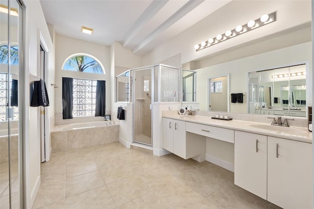 bathroom with vanity, a bath, a stall shower, and tile patterned flooring