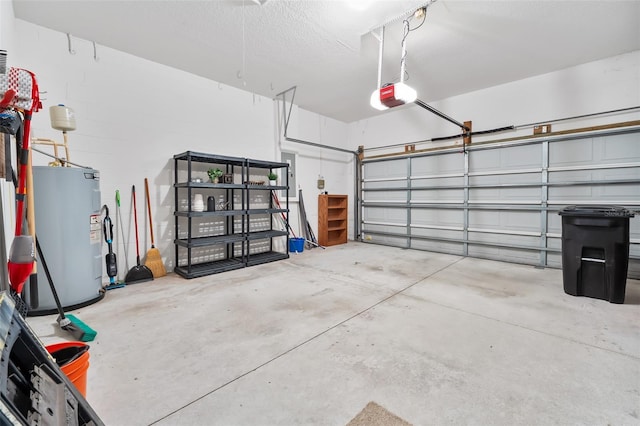 garage with a garage door opener and water heater