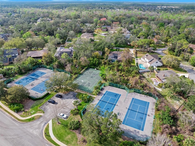 bird's eye view featuring a wooded view