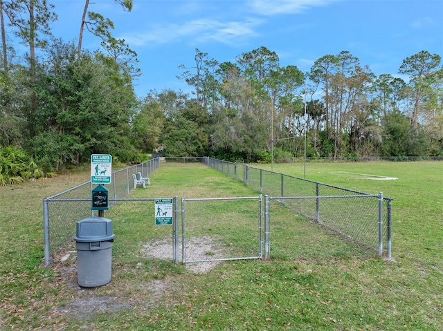 view of yard with a gate and fence