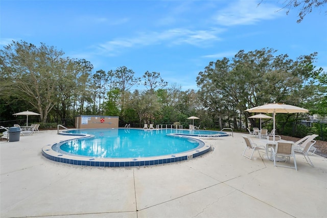 pool featuring a patio area