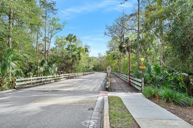 view of road featuring curbs