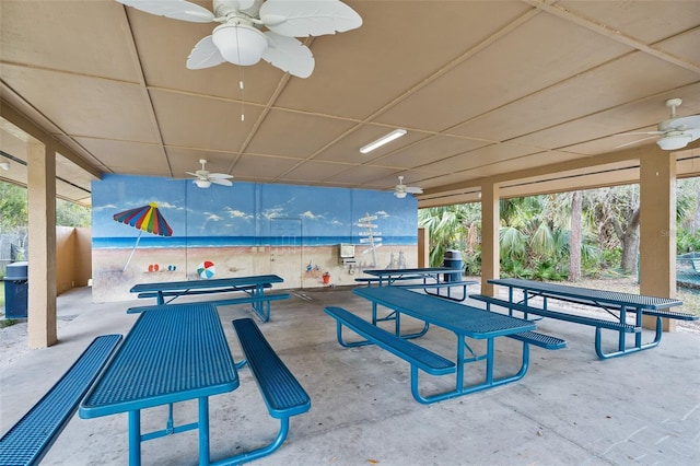 surrounding community featuring a patio area and outdoor dining space