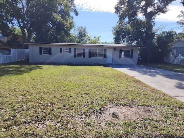 ranch-style house with a front yard