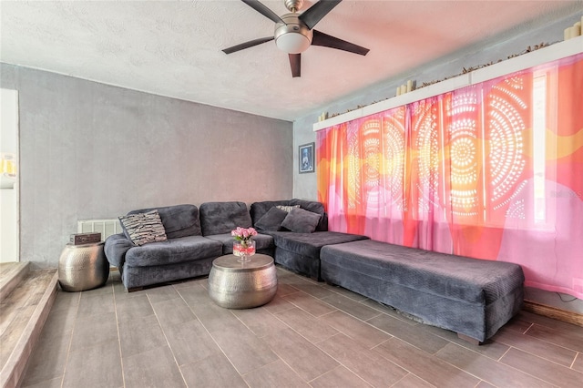 living room with ceiling fan