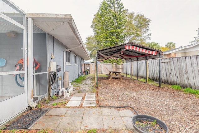 view of patio / terrace featuring a carport