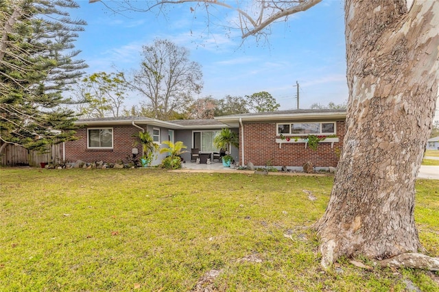 exterior space with a yard and a patio