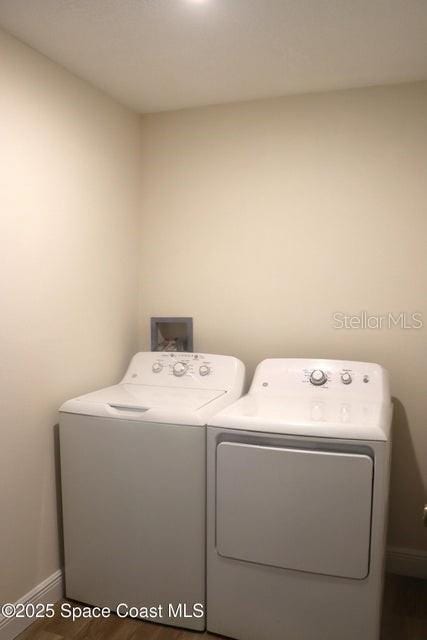 laundry area with washer and dryer