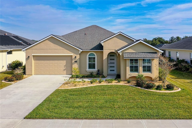 single story home with a garage and a front yard