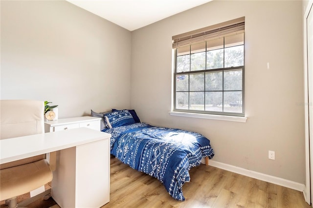 bedroom featuring light wood-type flooring