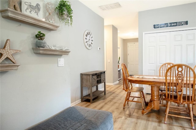 dining room featuring light wood-type flooring