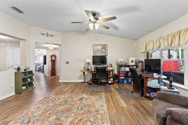 office space featuring lofted ceiling, hardwood / wood-style flooring, and ceiling fan