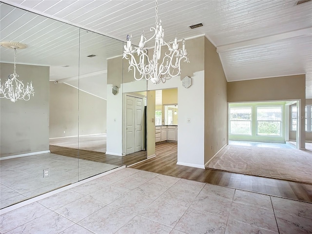 interior space featuring light tile patterned flooring, vaulted ceiling, wooden ceiling, and an inviting chandelier