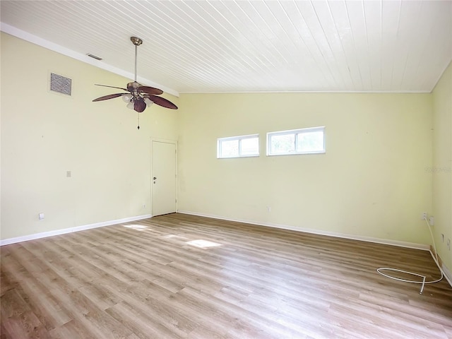 unfurnished room featuring lofted ceiling, ceiling fan, and light wood-type flooring