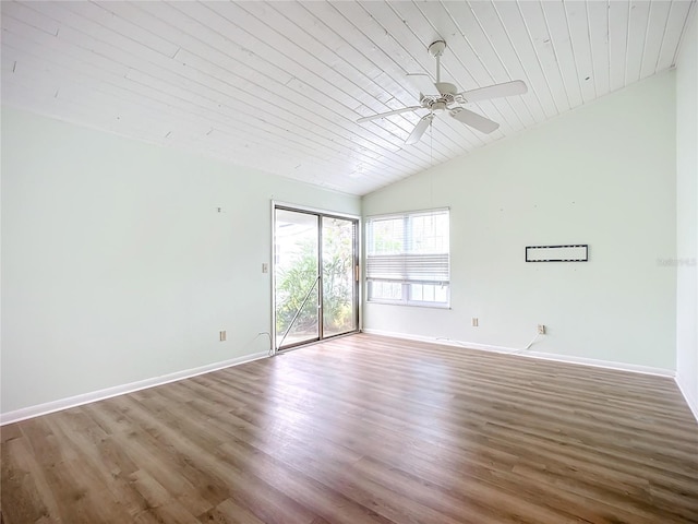 empty room with wood ceiling, hardwood / wood-style flooring, vaulted ceiling, and ceiling fan