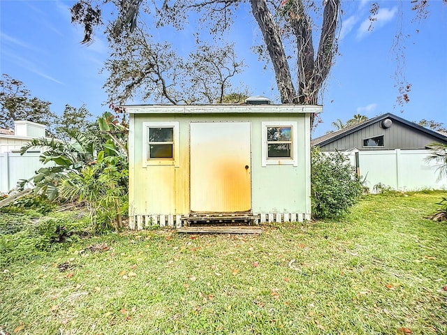 view of outdoor structure with a yard