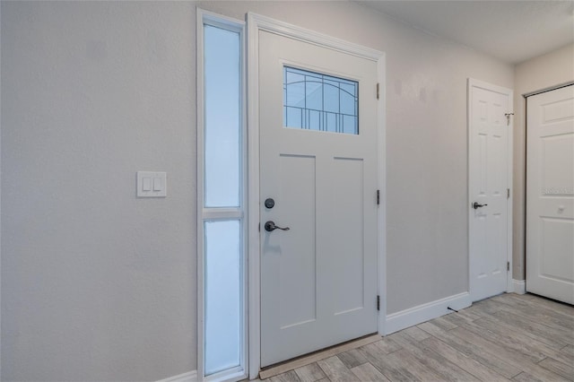 foyer featuring light hardwood / wood-style floors