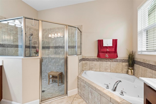 bathroom featuring vanity, tile patterned floors, and plus walk in shower