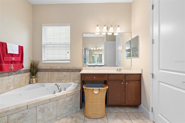 bathroom featuring vanity, tiled bath, and tile patterned flooring