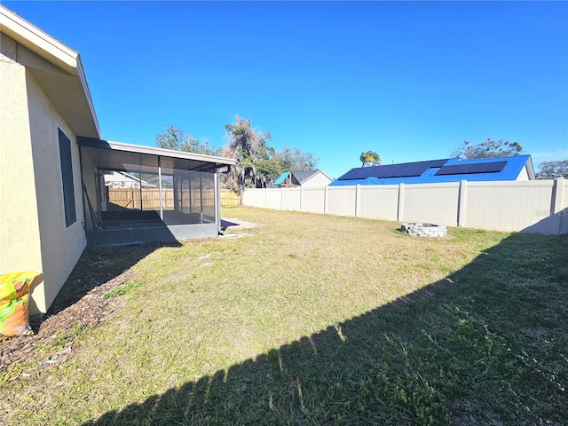 view of yard with a sunroom