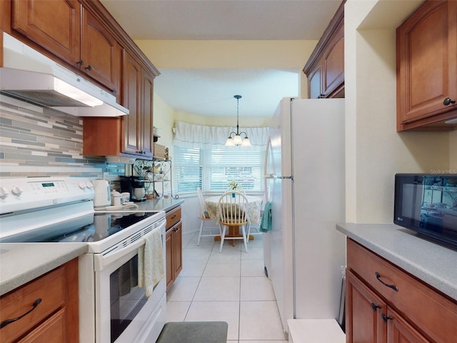 kitchen featuring decorative light fixtures, a chandelier, decorative backsplash, light tile patterned floors, and white appliances