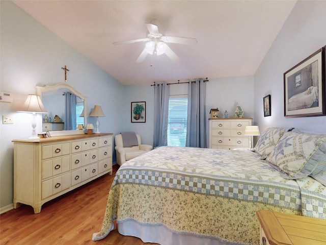 bedroom featuring ceiling fan and light hardwood / wood-style flooring