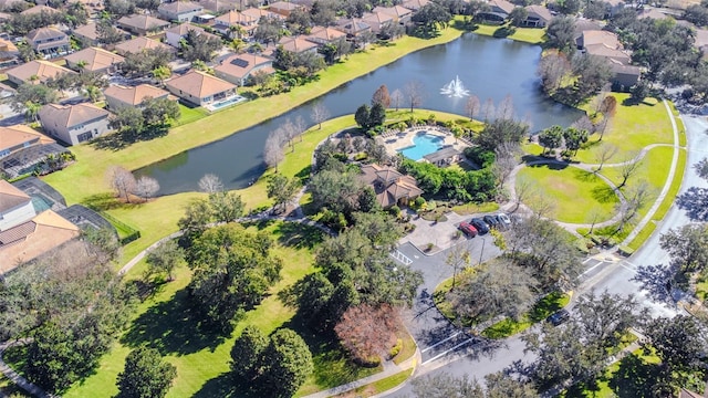 aerial view featuring a residential view and a water view