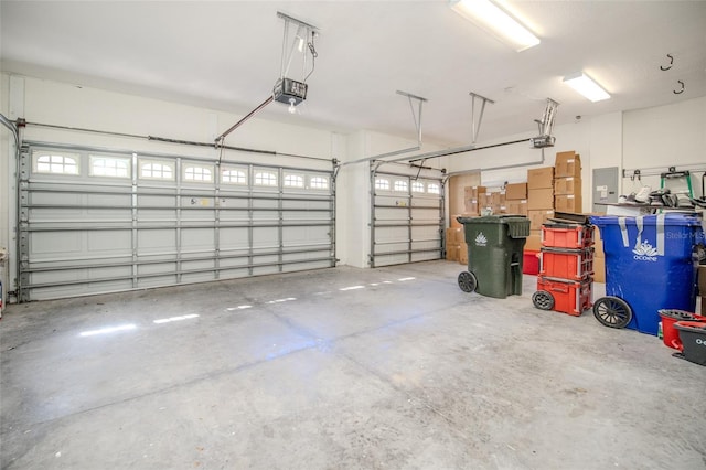 garage featuring a garage door opener