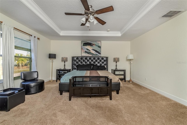 carpeted bedroom featuring a raised ceiling, visible vents, a textured ceiling, and baseboards