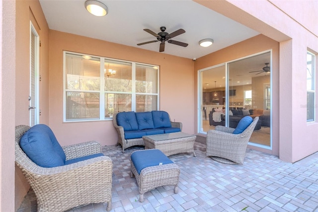 view of patio / terrace with ceiling fan and an outdoor hangout area