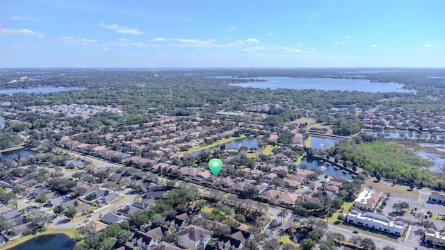 aerial view with a water view and a residential view