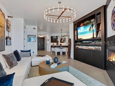 living room with a chandelier