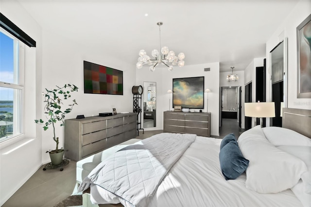 bedroom with a chandelier