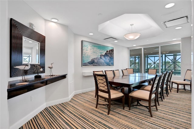 dining space featuring carpet flooring