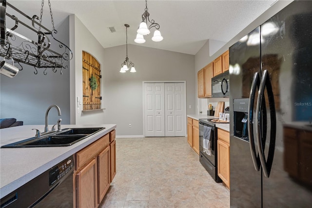 kitchen with sink, an inviting chandelier, vaulted ceiling, hanging light fixtures, and black appliances