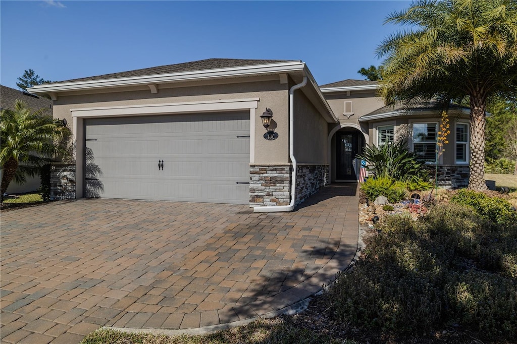 view of front of property with a garage