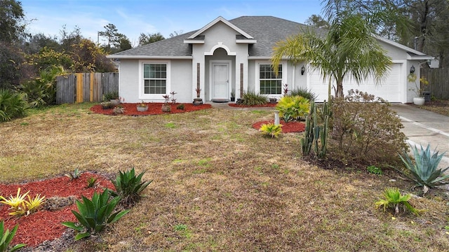 ranch-style house with a garage and a front lawn