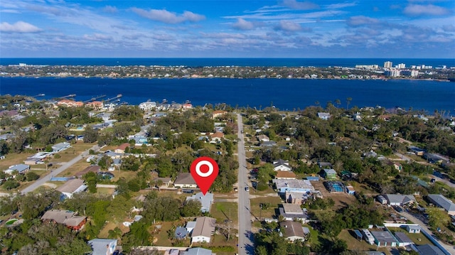 drone / aerial view with a water view