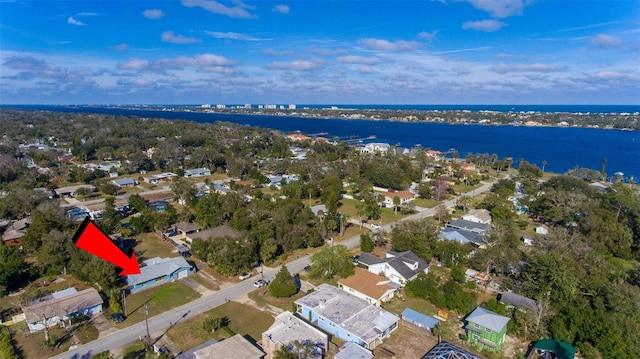 drone / aerial view with a water view