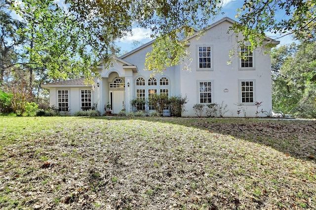 view of front facade with a front lawn