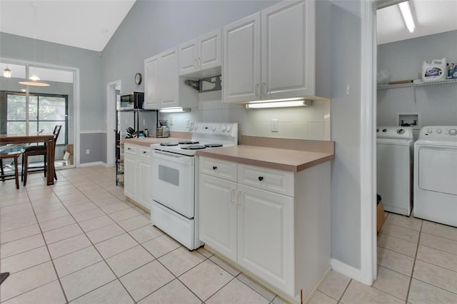 kitchen featuring white electric stove, white cabinetry, light tile patterned floors, and independent washer and dryer