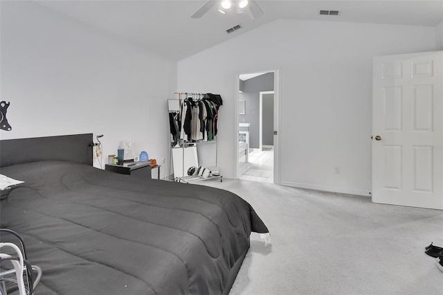 carpeted bedroom featuring ceiling fan and lofted ceiling