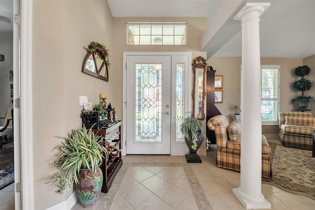 tiled foyer entrance with ornate columns