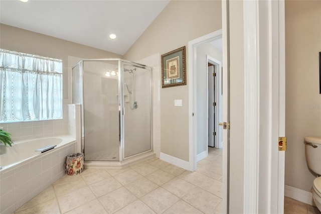 bathroom with independent shower and bath, vaulted ceiling, tile patterned flooring, and toilet