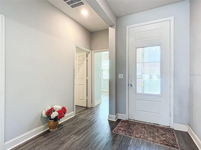 doorway with dark hardwood / wood-style floors