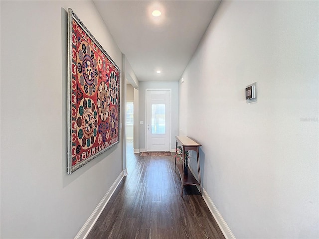 hallway featuring dark wood-type flooring