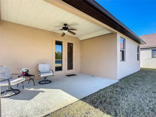 view of patio / terrace with ceiling fan and french doors