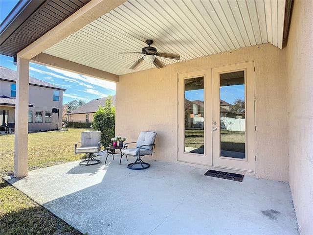 view of patio / terrace with ceiling fan and french doors