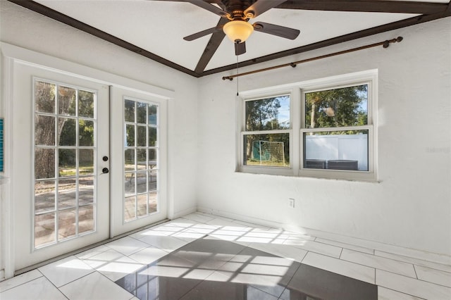 spare room with light tile patterned floors, ceiling fan, and french doors