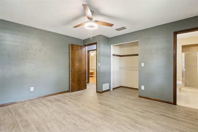 unfurnished bedroom with ceiling fan, a closet, and light hardwood / wood-style flooring